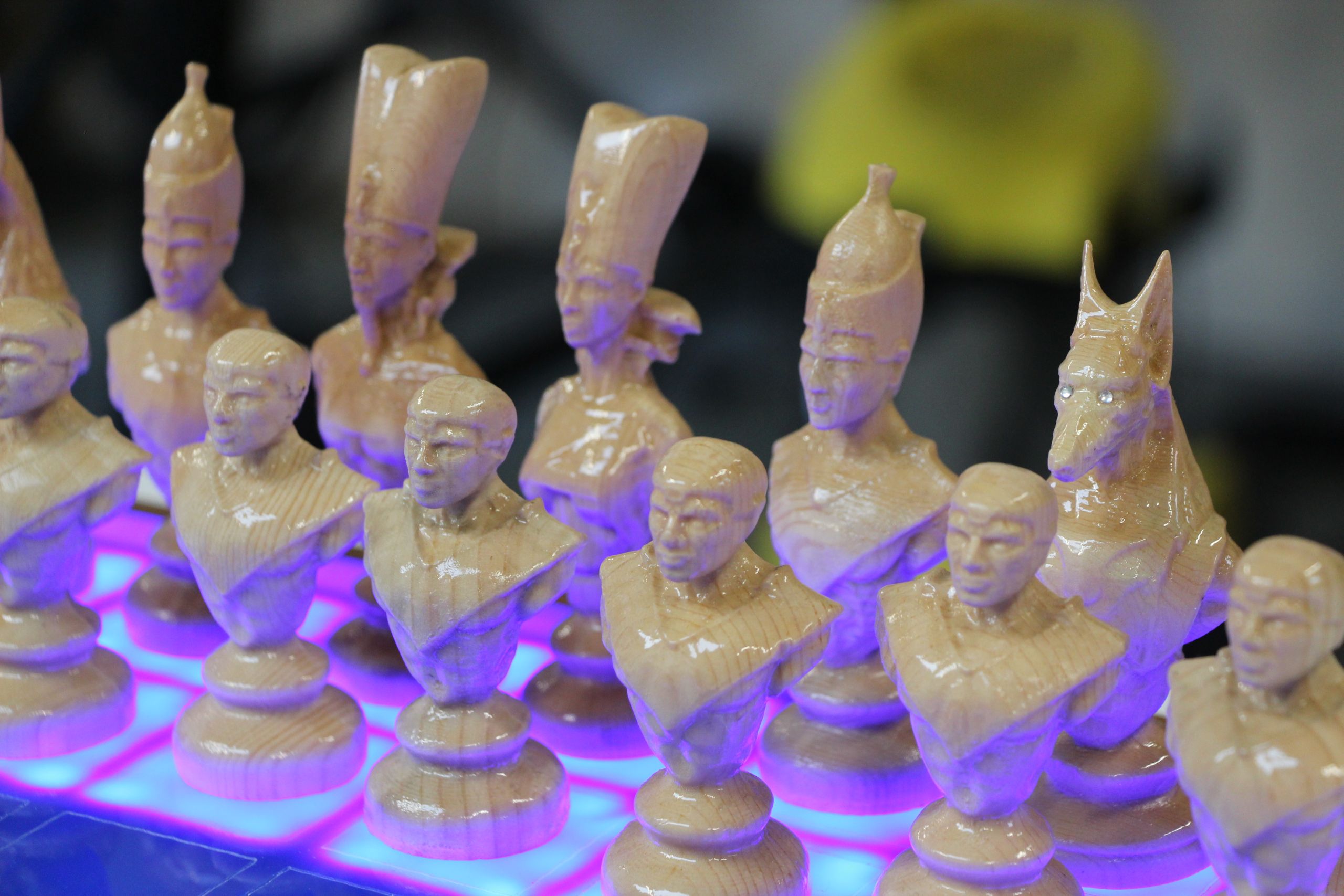 An Egyptian themed chess set carved out of pine wood with Carveco Maker. The board is lit with LED lights in each square.